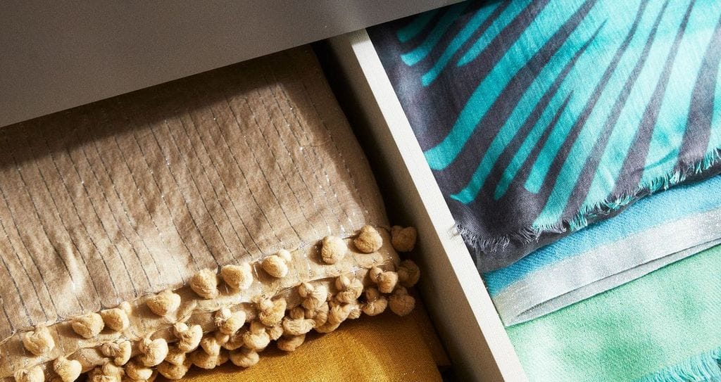 Custom detail of drawer opening in Martha Stewart's walk in closet created by California Closets