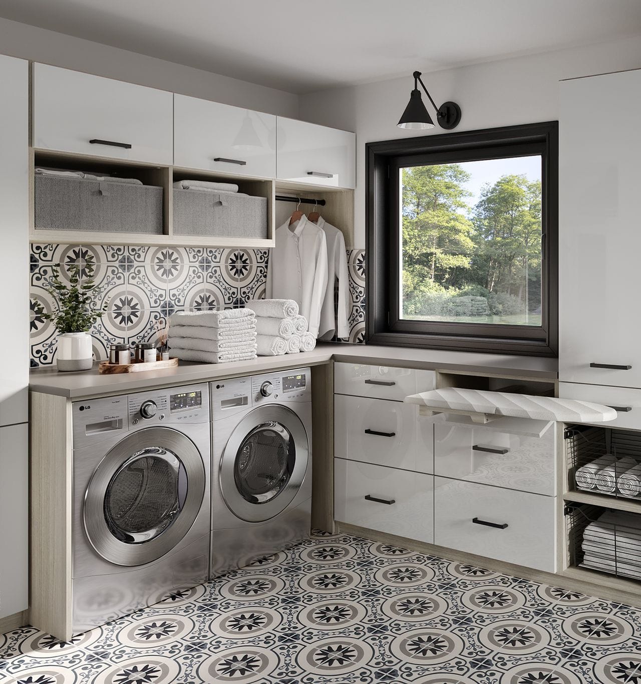 Laundry room and utility room design that has shelves, cabinets, and linen storage in white gloss finish by California Closets