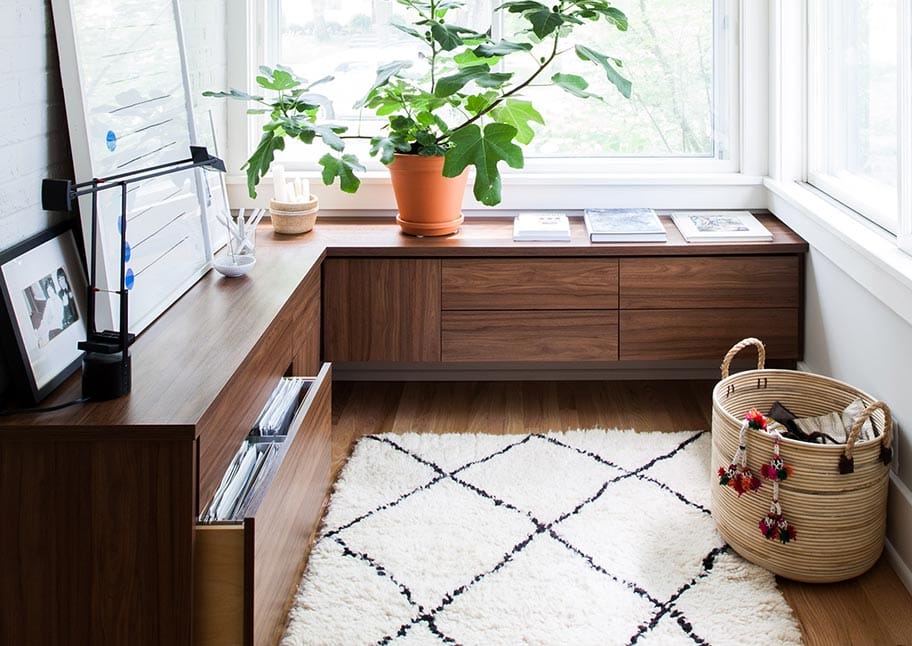 Dark wood finish in dining room designed by California Closets